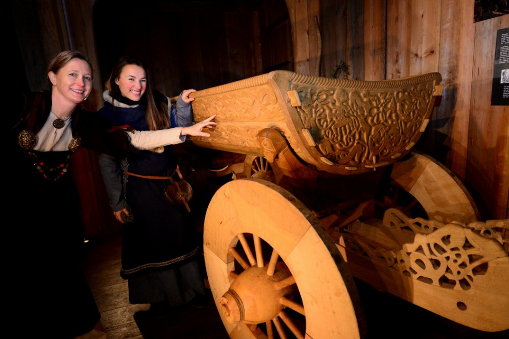 The wagon was discovered inside the Oseberg ship. The rich woodcarvings with mythical motives point towards a fertility cult. (Photo: Sidsel Winding-Stavseth/Tønsbergs Blad)