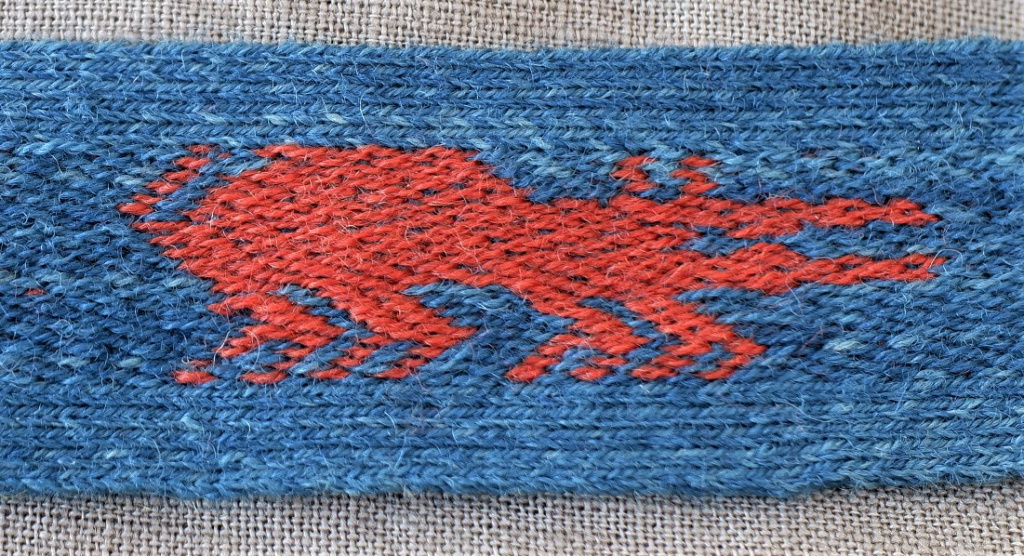 Figure 1: A weaving of one of the fantastical animals from the Evebø band. Photo: Author.  